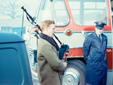 Marty McKenna playing bagpipes for George Stroud's departure. 