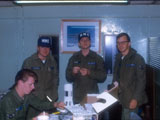 Building a rocket: (L-R) Robert Doughty, Chuck Schabel, Thomas Monk, Unknown.