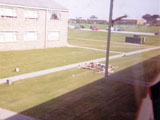 Catching some sun outside the barracks. 