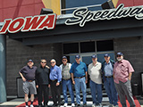 Group shot in front of the speedway