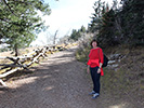 Dede takes a rest on the trail. The 10,000 foot elevation definitely was a factor!