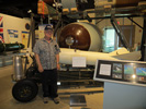 Chuck Schabel poses in front of an MB-1/AIR-2A Genie