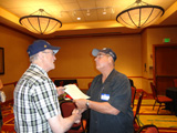 Steve Carr presents the pin to Gary Palmer
