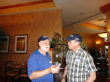Steve Carr presents the pin to Wayne Miller