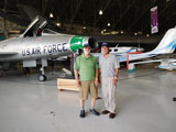 Wayne Miller and Bill Woodward pose in front of the F-100