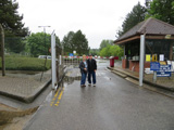 Chuck and Jeanne Schabel by the new main gate - located very close to where the base service station was. Submitted by Chuck Schabel