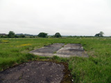 Pad where conventional munitions inspection and 20mm handling building was located (Bldg 240?). Submitted by Chuck Schabel